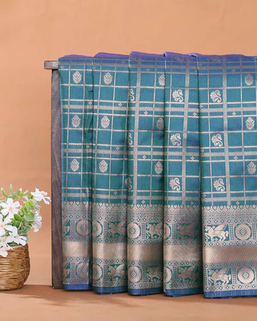 Semi Soft Silk Saree with Traditional Checked Pattern Intricate Woven Motifs and Elaborate Zari Border - Teal