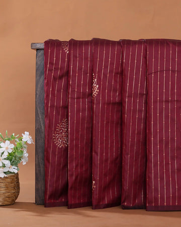 Semi Soft Silk Saree with Striped Zari Weave Intricate Leaf Motifs and Woven Border - Maroon