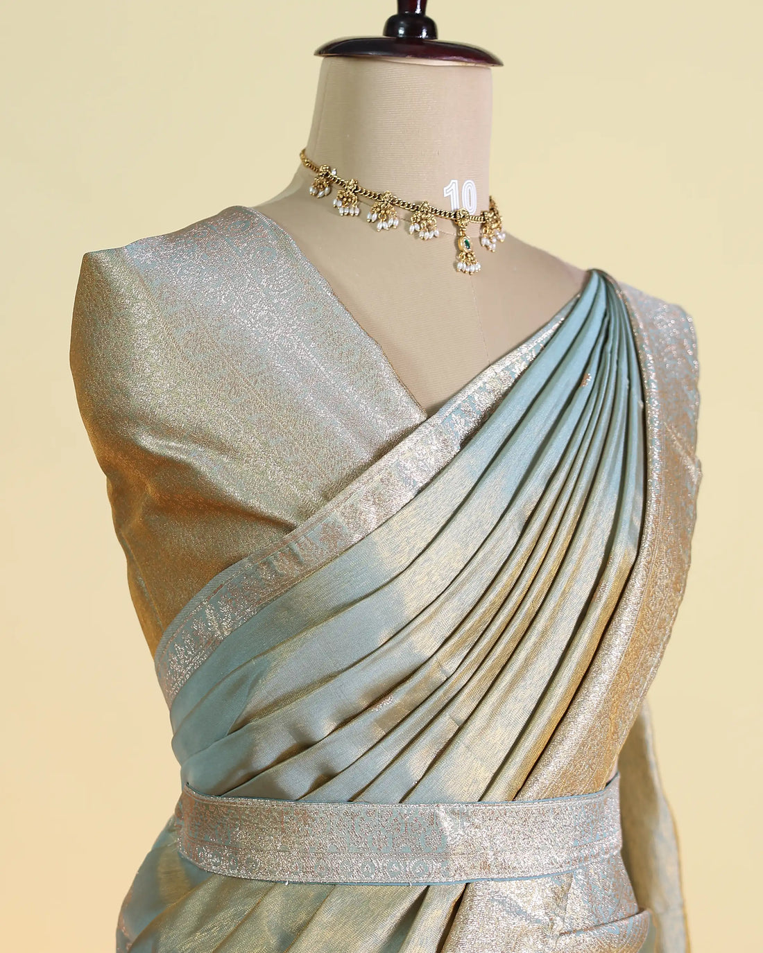 Women's Semi Stitched Dhavani Set with Floral Brocade Design Pleated Draping Metallic Woven Border Embellished Waist Belt and Matching Dupatta - Pastel Green