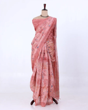 A pink floral printed saree  with a matching blouse