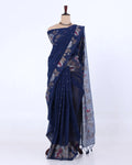 A navy blue saree with floral and geometric patterns