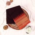 Kanchi Cotton Saree With Gold Zari Border And Red Orange Temple Motif Deep Brown Color Folded Flat Lay View
