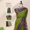Chettinad cotton saree with peacock zari woven border olive green plain body and contrast pallu front draped view on mannequin.