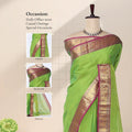Chettinad cotton saree with green body contrast pink zari border and butta motifs front draped view on mannequin.