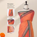 Chettinad cotton saree with orange plain body peacock zari border and butta motifs front draped view on mannequin.