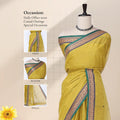 Chettinad cotton saree with yellow plain body peacock zari border and butta motifs front draped view on mannequin.