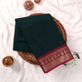 Kanchi Cotton Saree With Dark Green Body And Maroon Gold Zari Border Folded Display Top View
