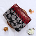Semi Chanderi saree with floral print maroon peacock zari border black body folded front view