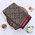 Semi Chanderi Saree with geometric woven motifs maroon contrast zari border grey body flat lay view