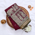 Semi Chanderi Saree featuring traditional temple art print and zari border in maroon - Close Up