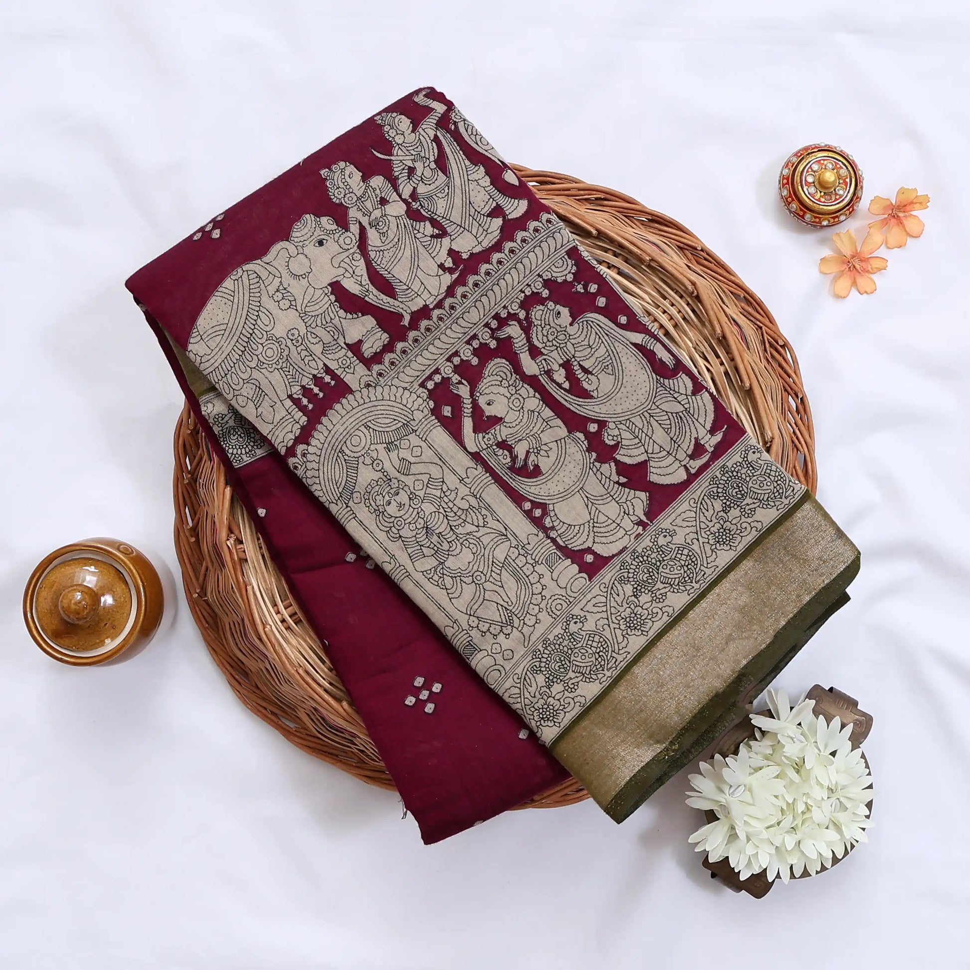 Semi Chanderi Saree featuring traditional temple art print and zari border in maroon - Close Up
