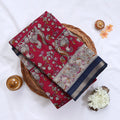 Pink Semi Chanderi  saree with peacock floral print and contrast woven border folded flat lay display.
