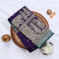 Semi Chanderi Saree featuring traditional temple art print and zari border in purple - Close Up