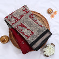 Semi Chanderi Saree featuring traditional temple art print and zari border in red - Close Up