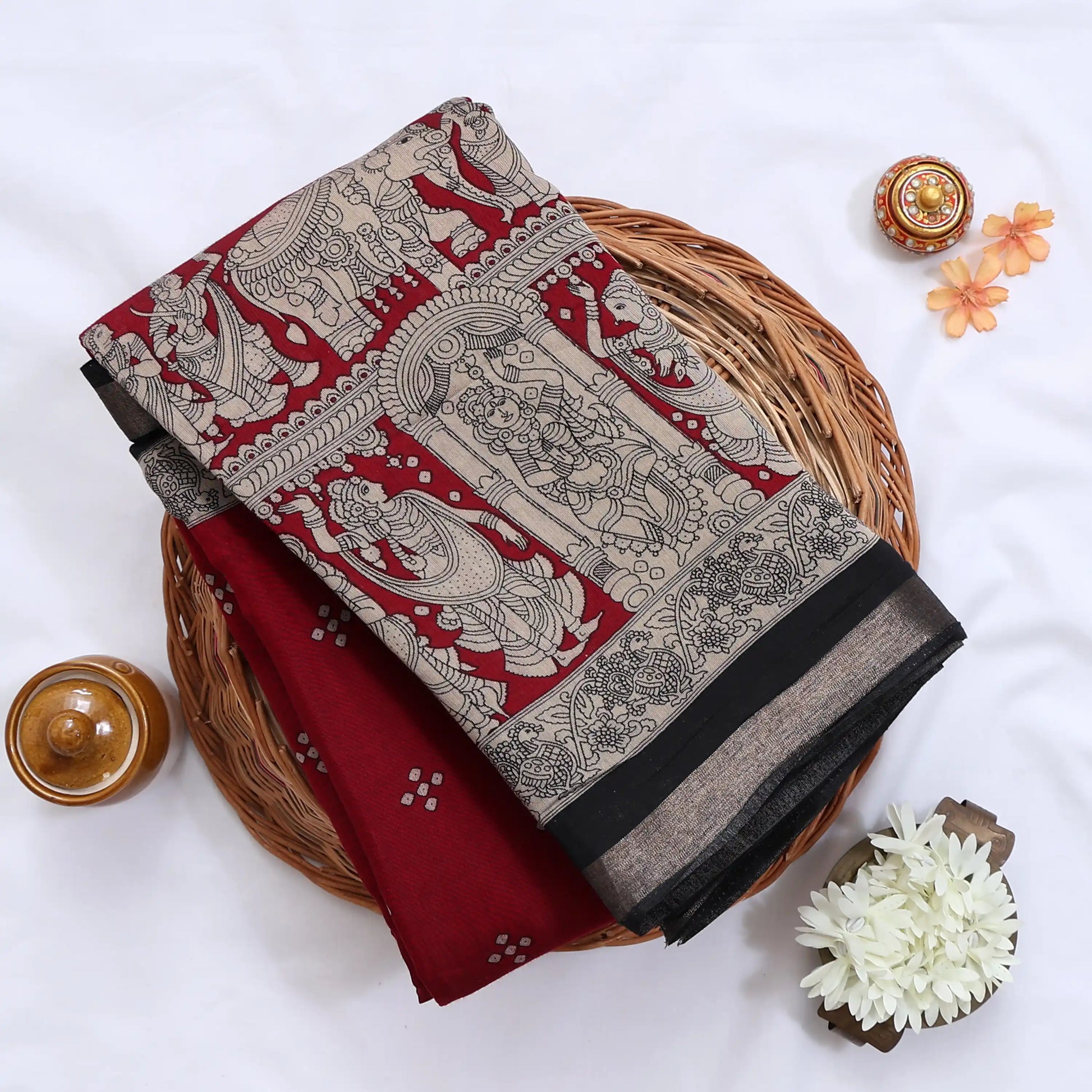 Semi Chanderi Saree featuring traditional temple art print and zari border in red - Close Up