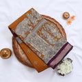 Semi Chanderi Saree featuring traditional temple art print and zari border in yellow - Close Up