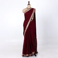 Mysore Silk saree with plain deep maroon body and silver zari woven border, front drape view