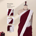 A deep maroon and white saree with detail of  head, blouse, and pallu.