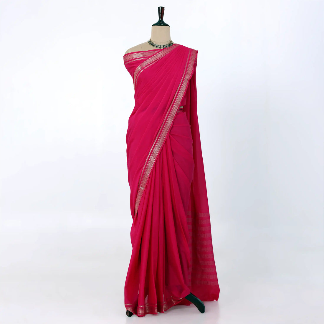 Mysore Silk saree with plain dark pink body and golden zari woven border, front drape view