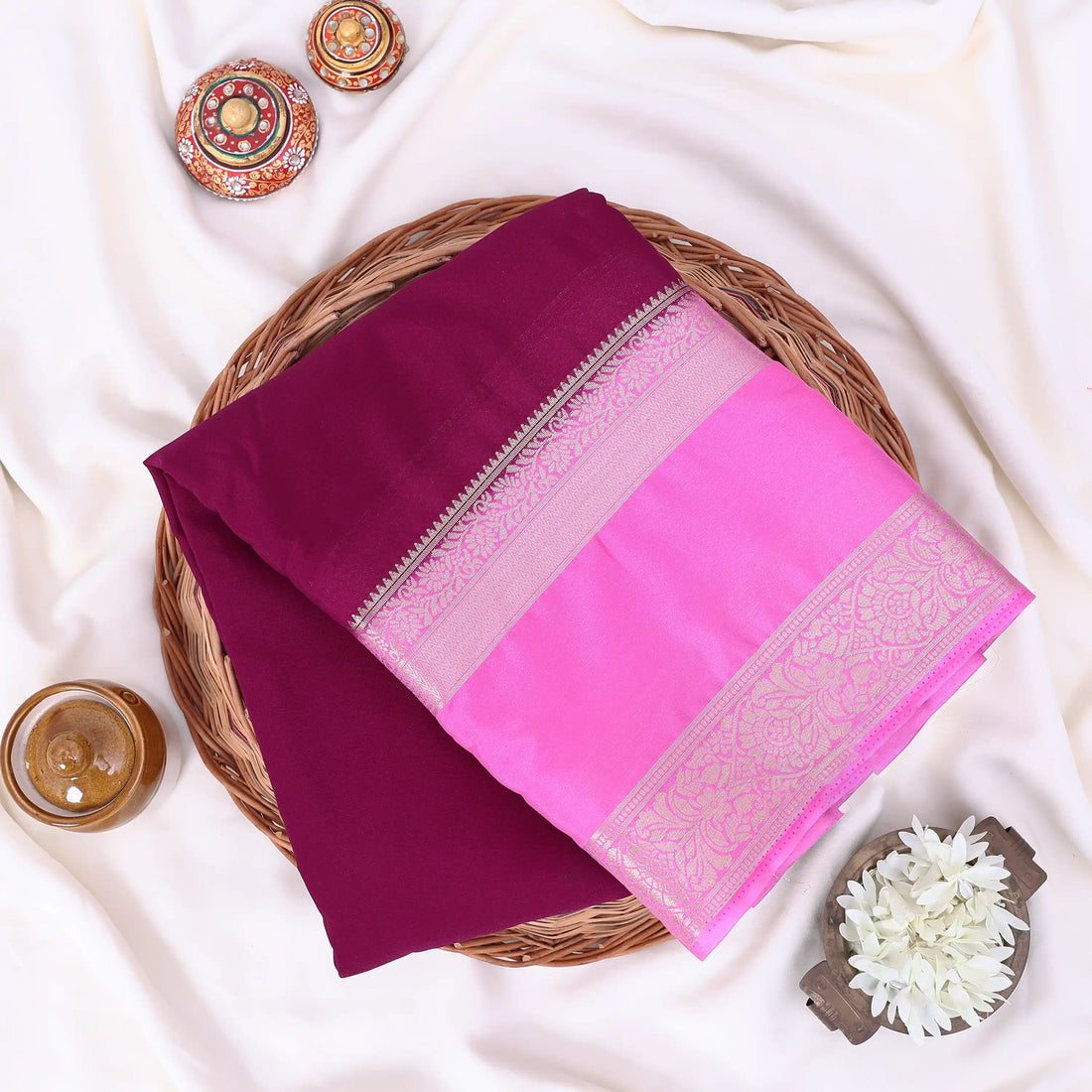 Mysore Silk saree with plain purple body and silver with pink zari woven border, front drape view