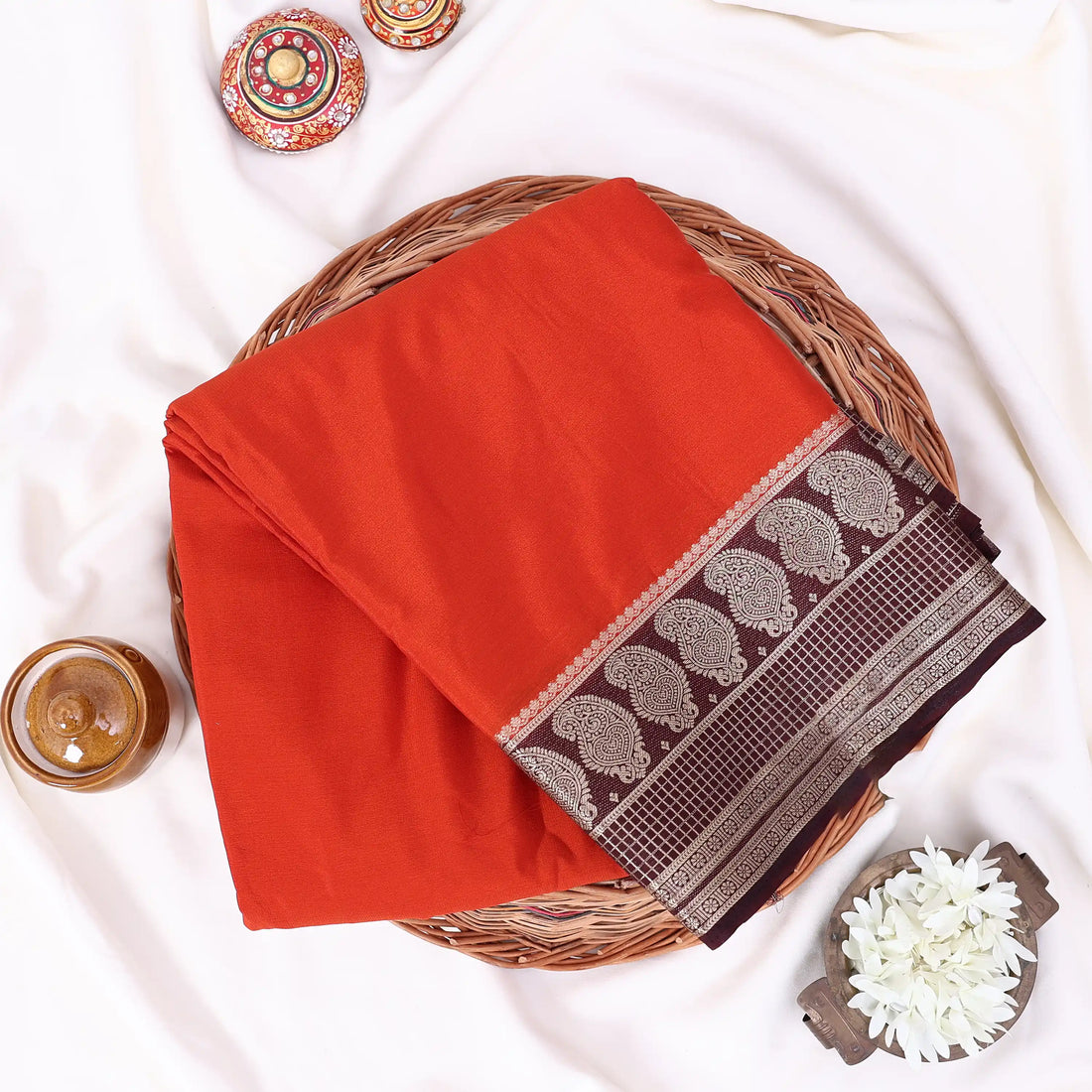 Mysore Silk saree with plain red body and ogolden  zari woven border, front drape view