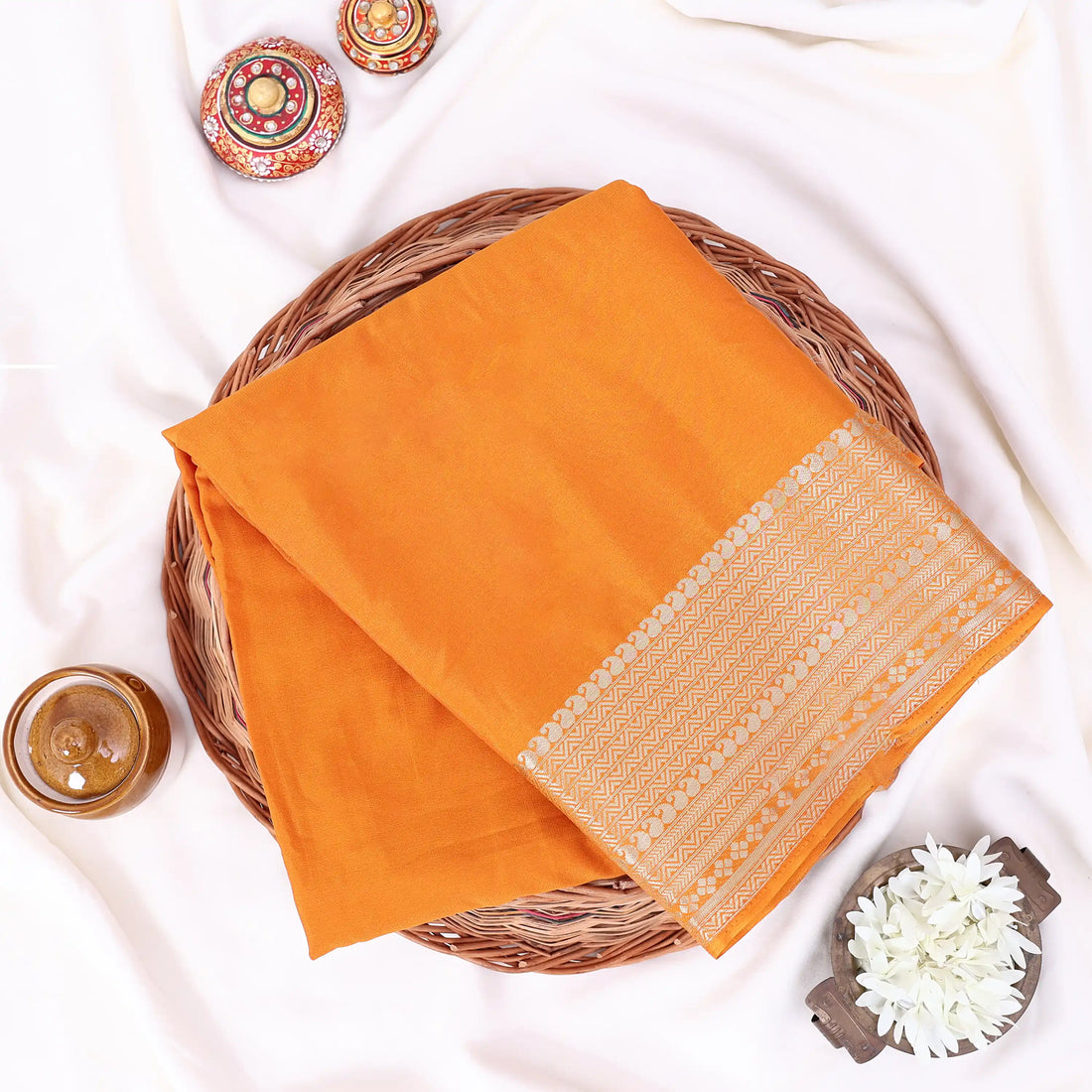 Mysore Silk saree with plain dark yellow body and golden zari woven border, front drape view