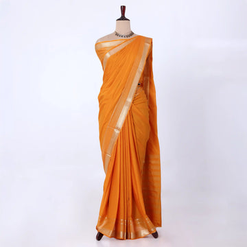 Mysore Silk saree with plain mustard yellow body and gold zari woven border, front drape view