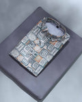 Patterned shirt on a gray surface