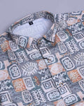 Patterned shirt with geometric design on a gray background