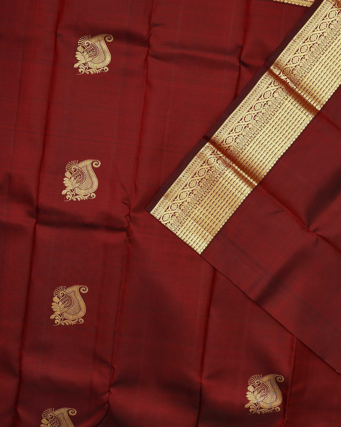 Exquisite Niranjana Silk Saree with Intricate Zari Weave and Peacock Motif - Maroon