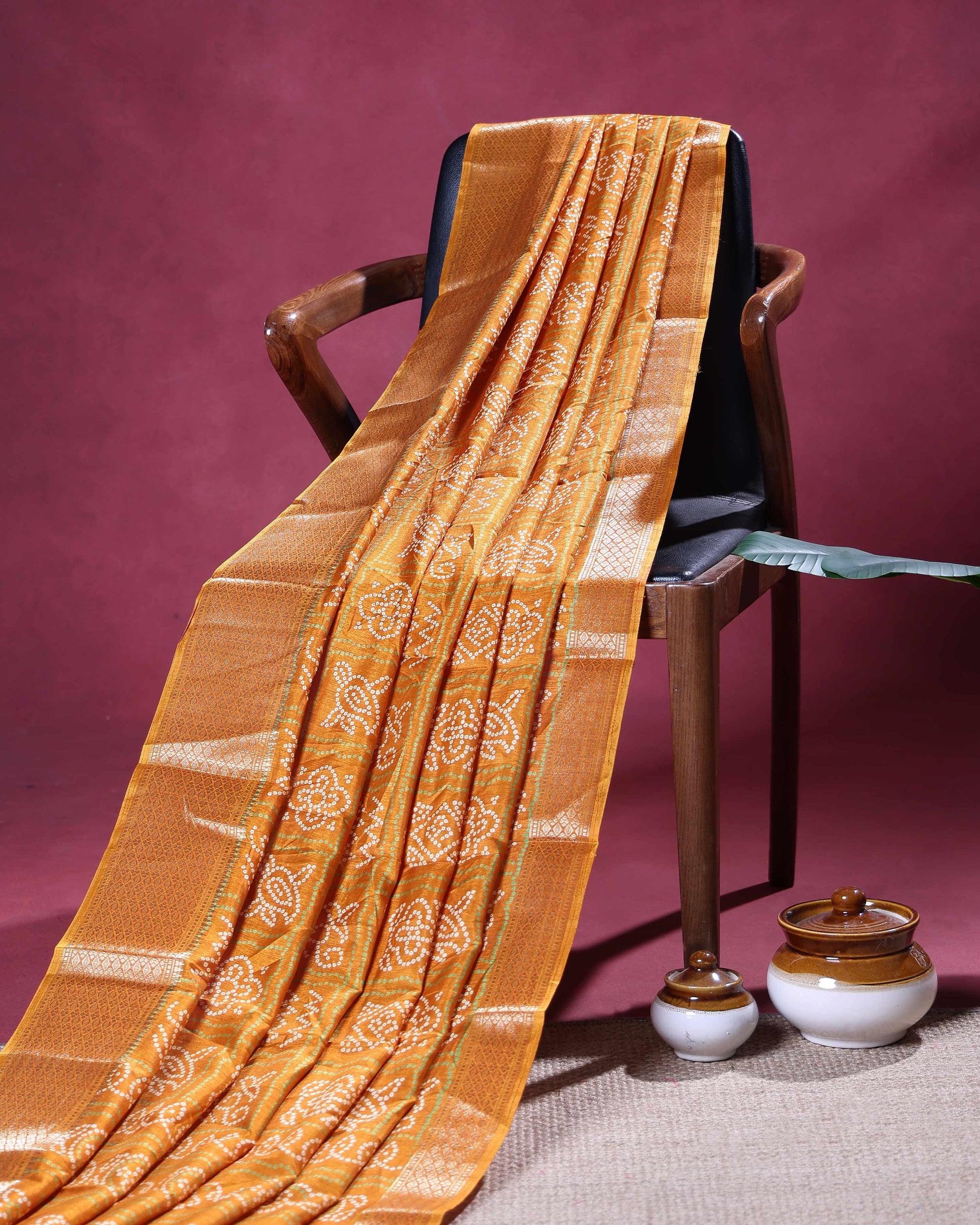 Traditional Dola Silk Saree with All-Over Bandhani Inspired Motifs and Intricate Woven Border  - Orange