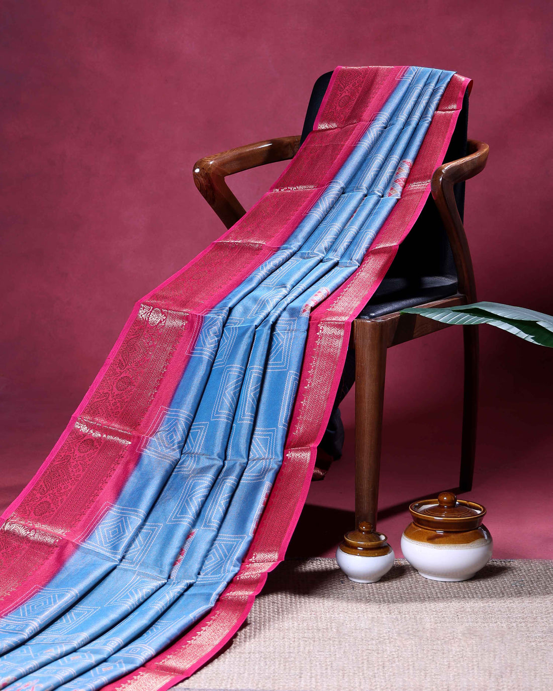 Traditional Dola Silk Saree with Geometric Diamond Motifs and Intricate Woven Border - Light Blue
