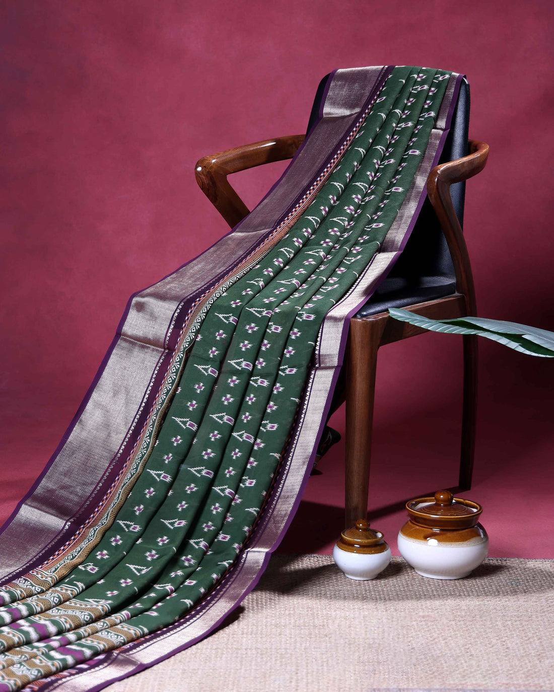 Traditional Dola Silk Saree with Intricate Ikkat Inspired Buta Motifs and Ornate Contrast Border - Green