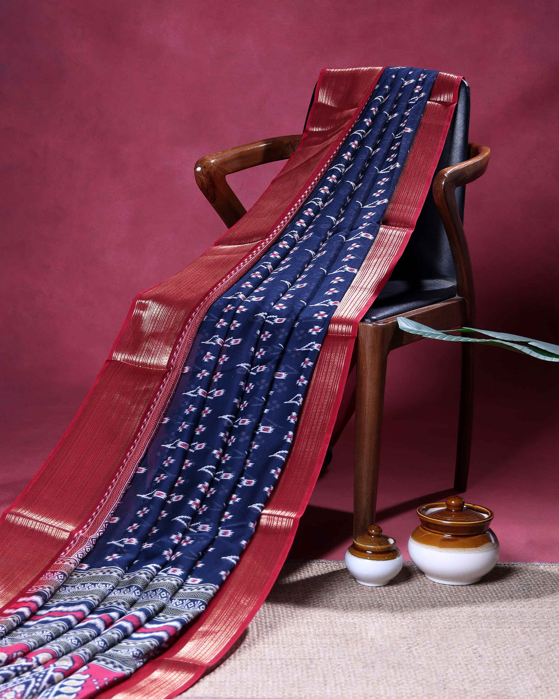 Traditional Dola Silk Saree with Intricate Ikkat Inspired Buta Motifs and Ornate Contrast Border - Navy Blue