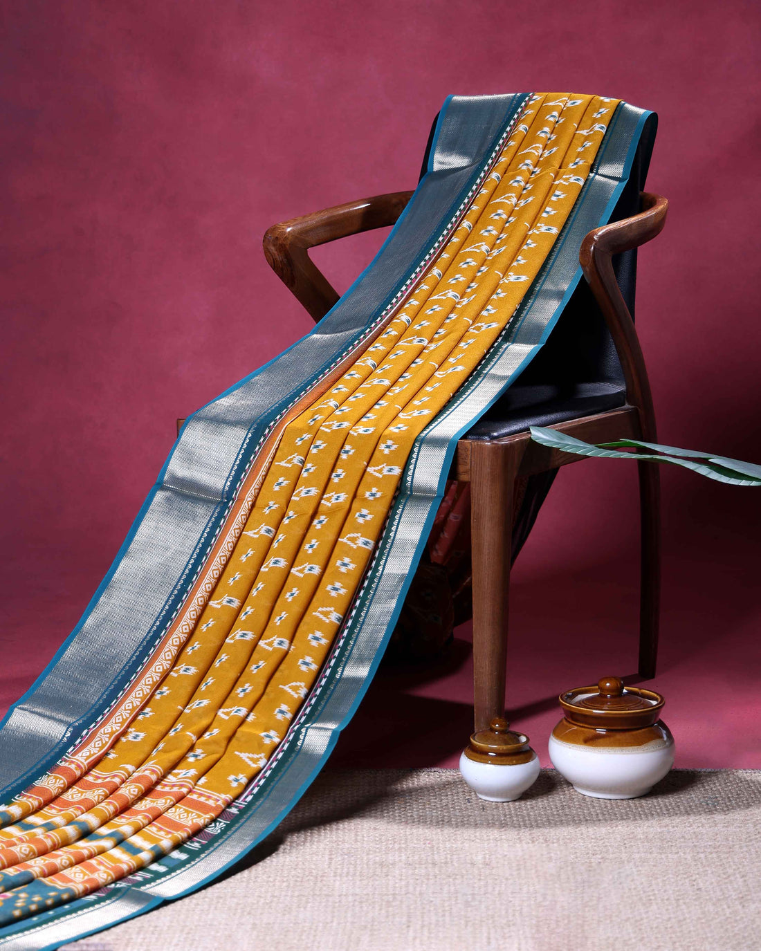 Traditional Dola Silk Saree with Intricate Ikkat Inspired Buta Motifs and Ornate Contrast Border - Yellow