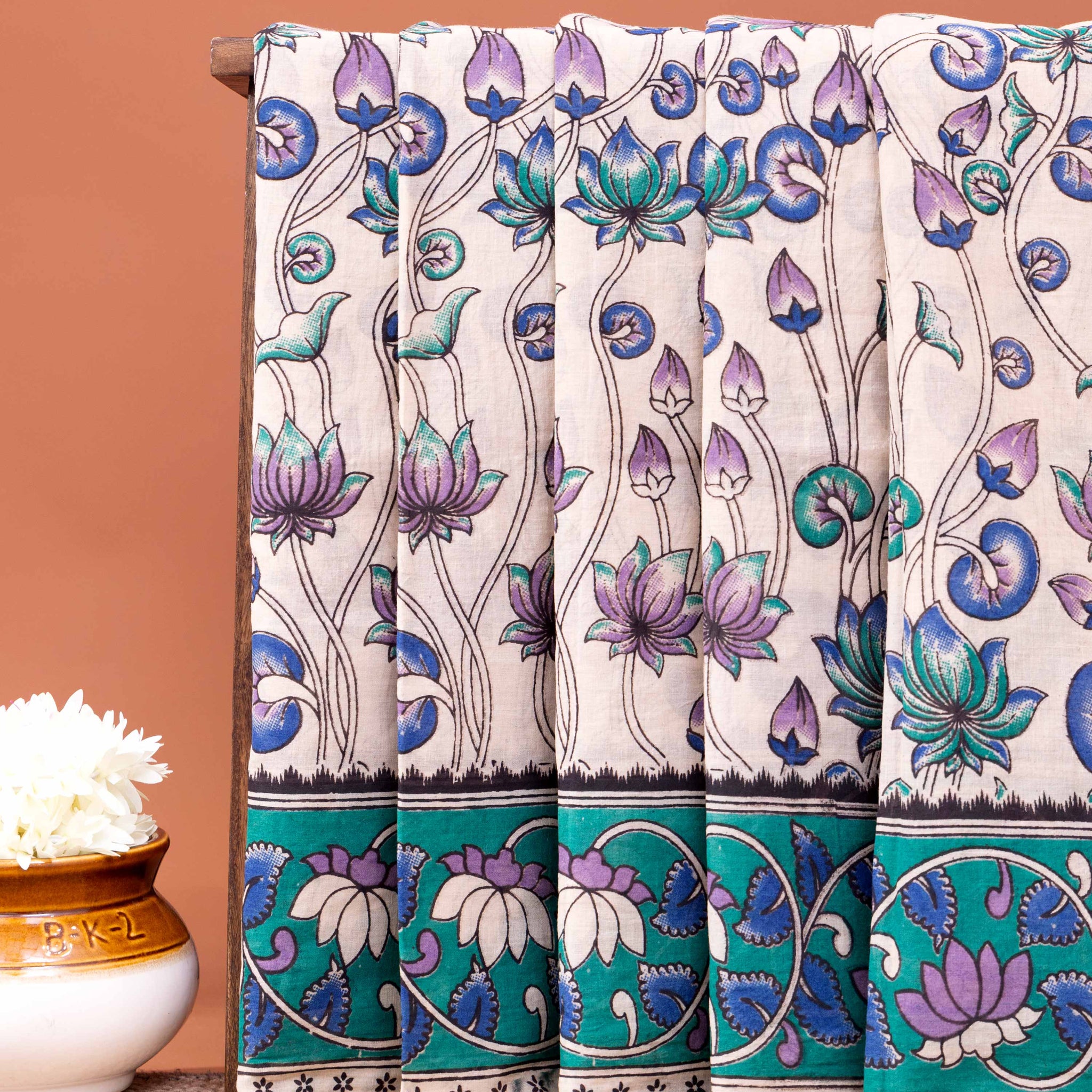 Traditional Hand-Painted Kalamkari Cotton Saree with Lotus Motif and Intricate Border - Cream