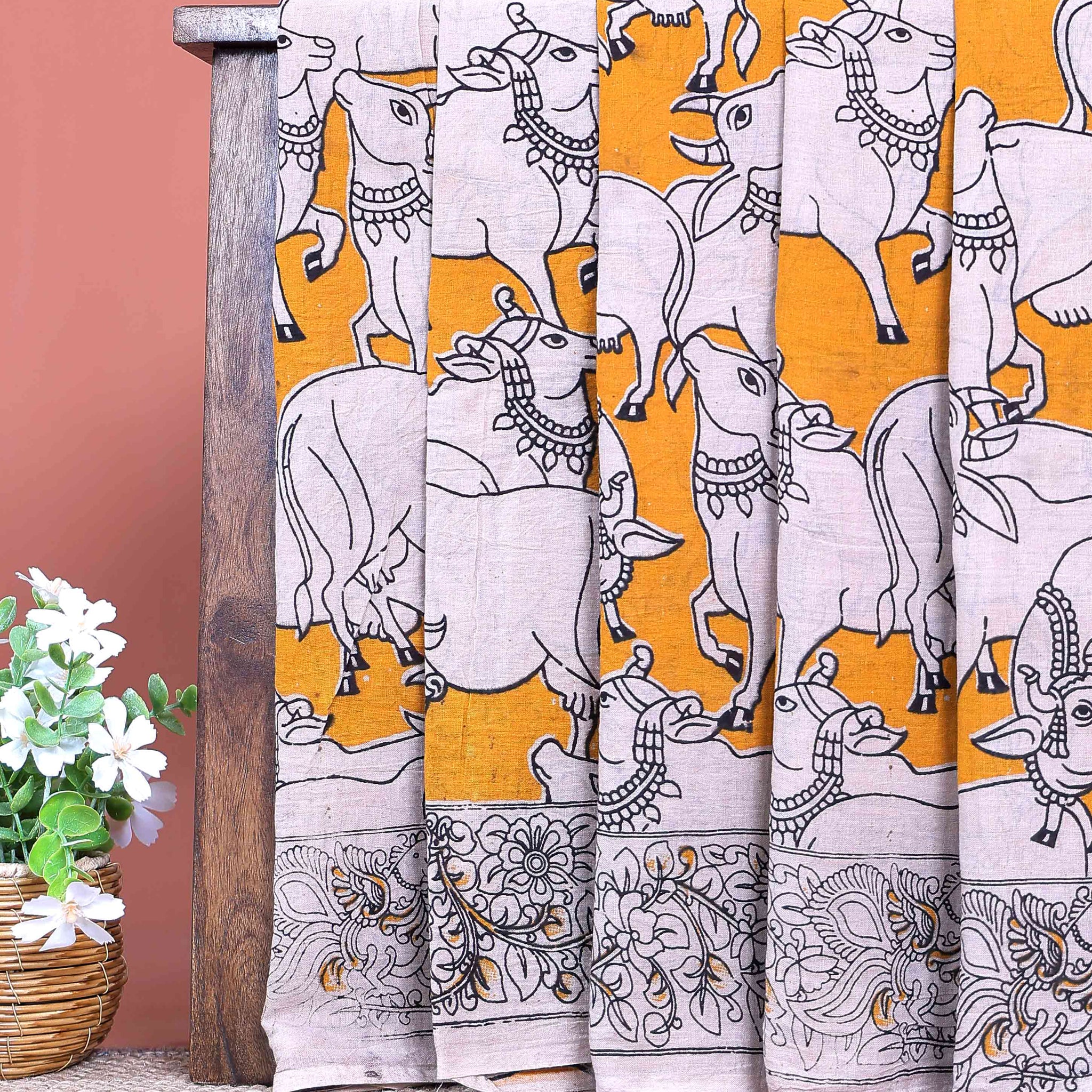 Traditional Handcrafted Kalamkari Cotton Saree with Traditional Cow Motifs and Floral Border - Yellow
