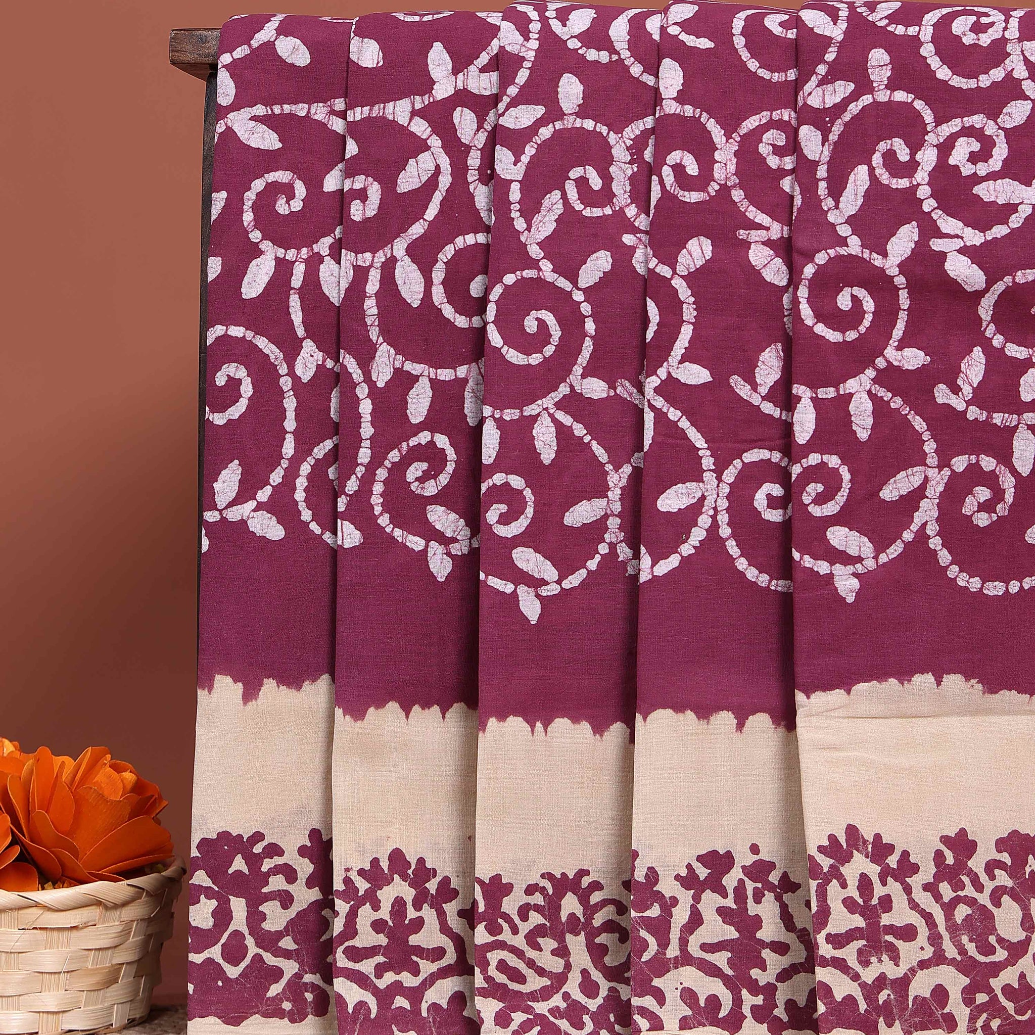 Traditional Handloom Cotton Saree with All-Over Batik Prints and Contrast Border - Onion Pink