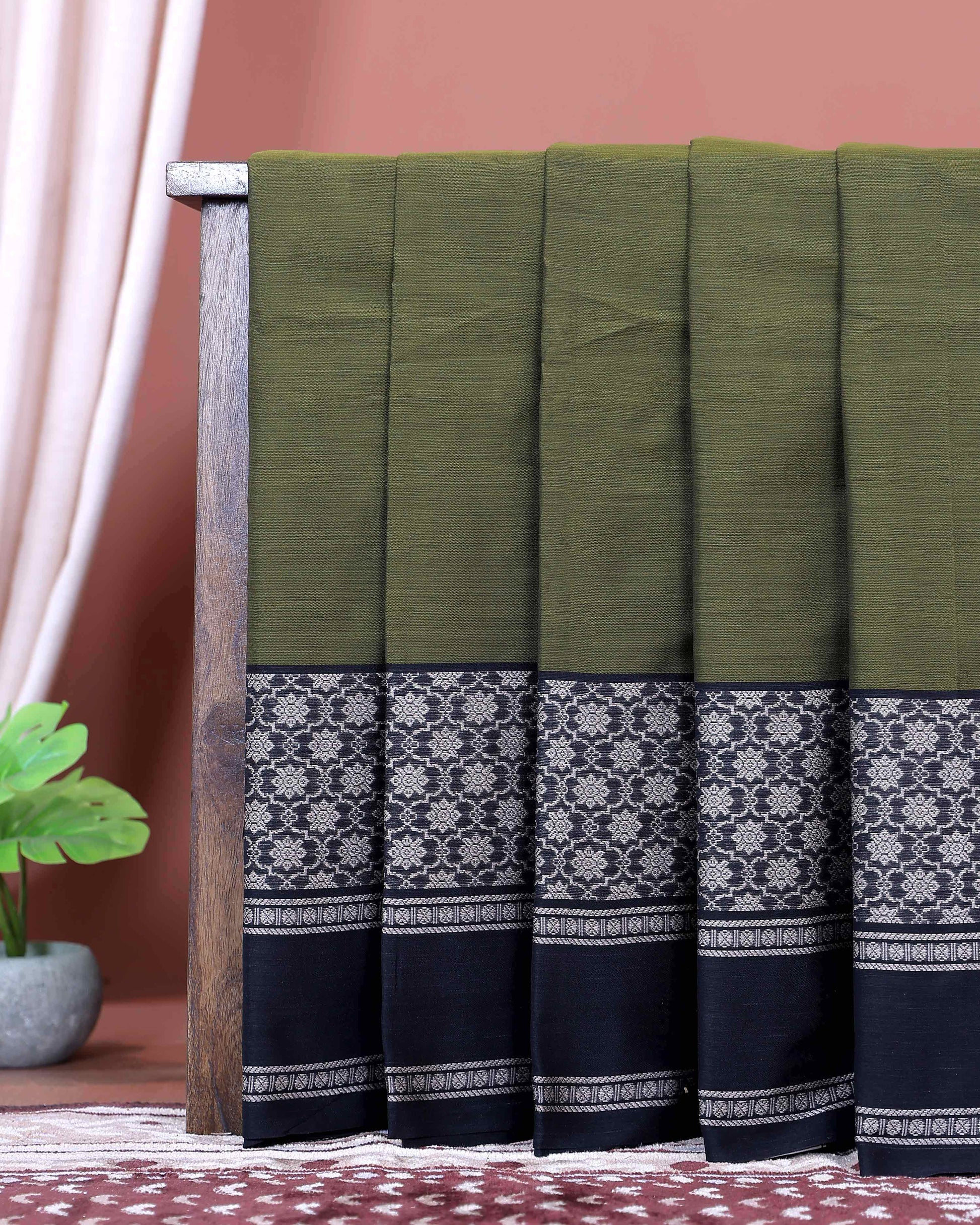 Traditional_Narayanpet_Handloom_Cotton_Saree_with_Intricate_Zari_Woven_Contrast_Border_and_Ethnic_Motifs_-_Green-one