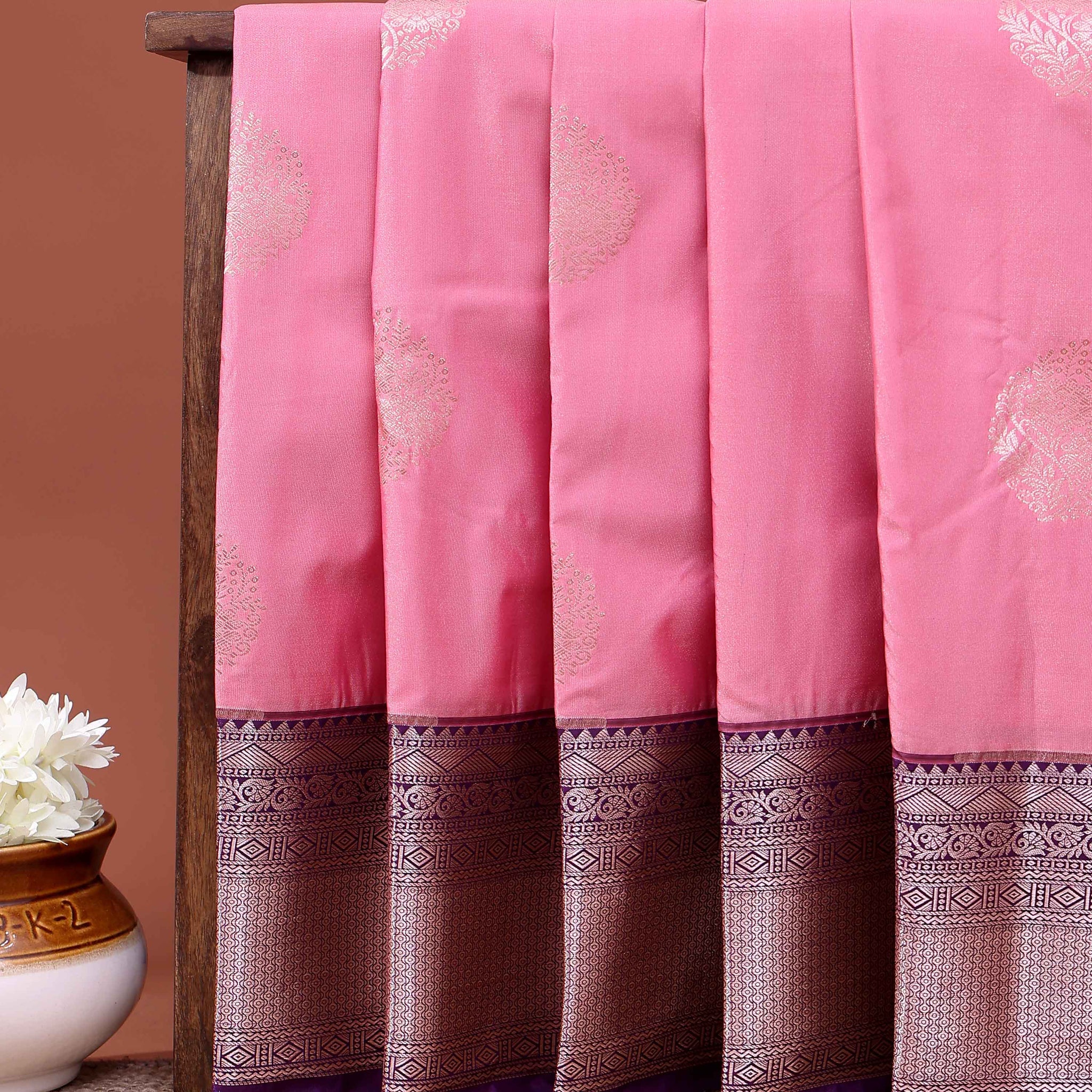 Traditional Niranjana Silk Saree Adorned with Woven Zari Motifs and a Contrasting Border - Pink