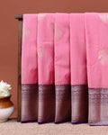 Traditional Niranjana Silk Saree Adorned with Woven Zari Motifs and a Contrasting Border - Pink