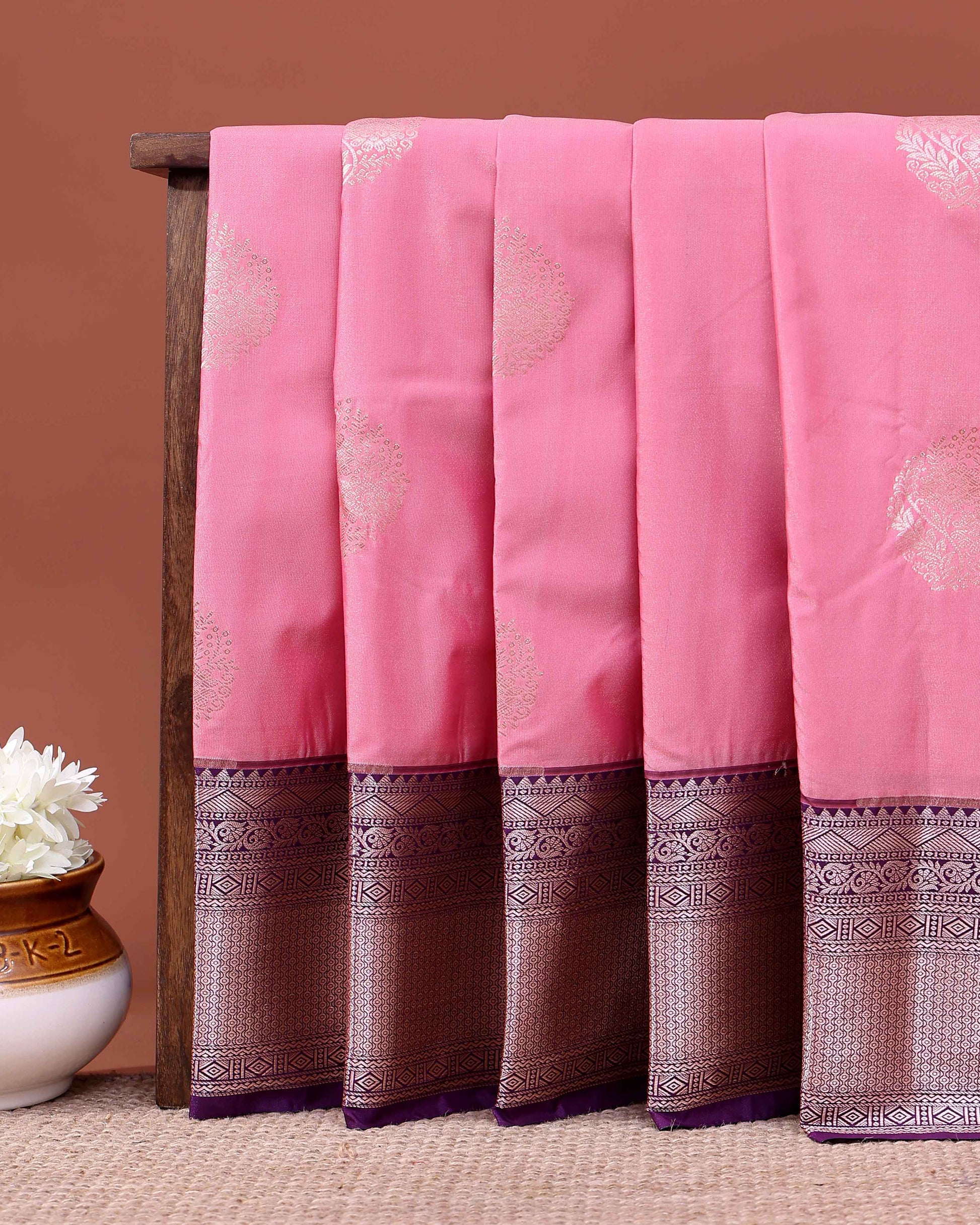 Traditional Niranjana Silk Saree Adorned with Woven Zari Motifs and a Contrasting Border - Pink