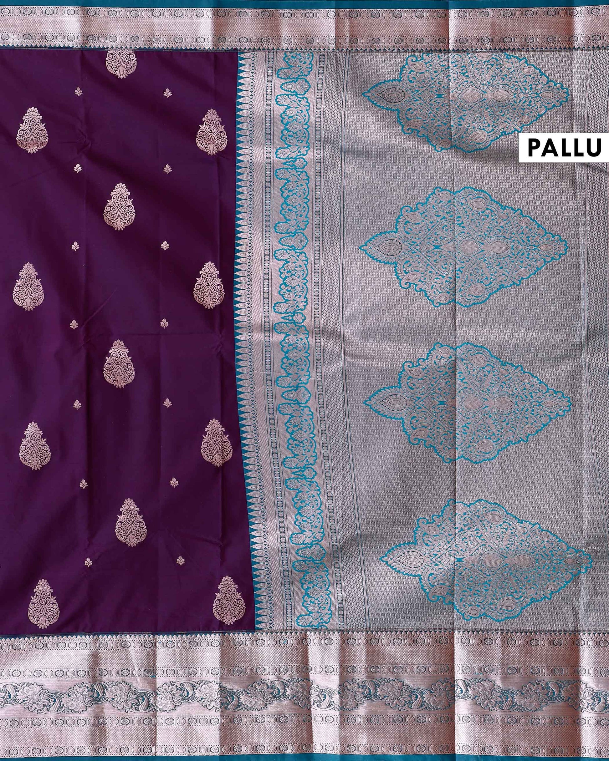 Traditional Niranjana Silk Saree with Intricate Zari Weave and Peacock Motif Border - Purple