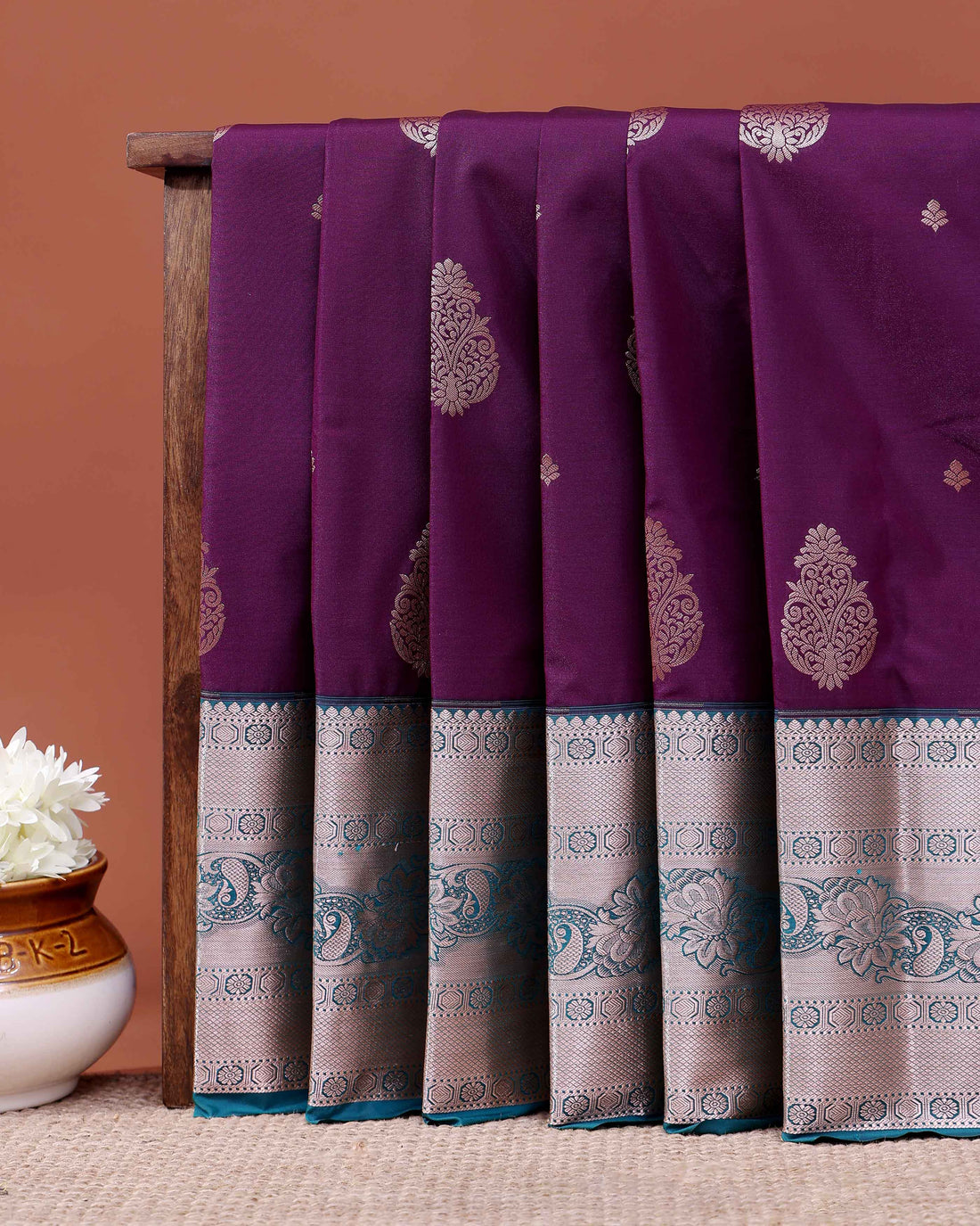 Traditional Niranjana Silk Saree with Intricate Zari Weave and Peacock Motif Border - Purple