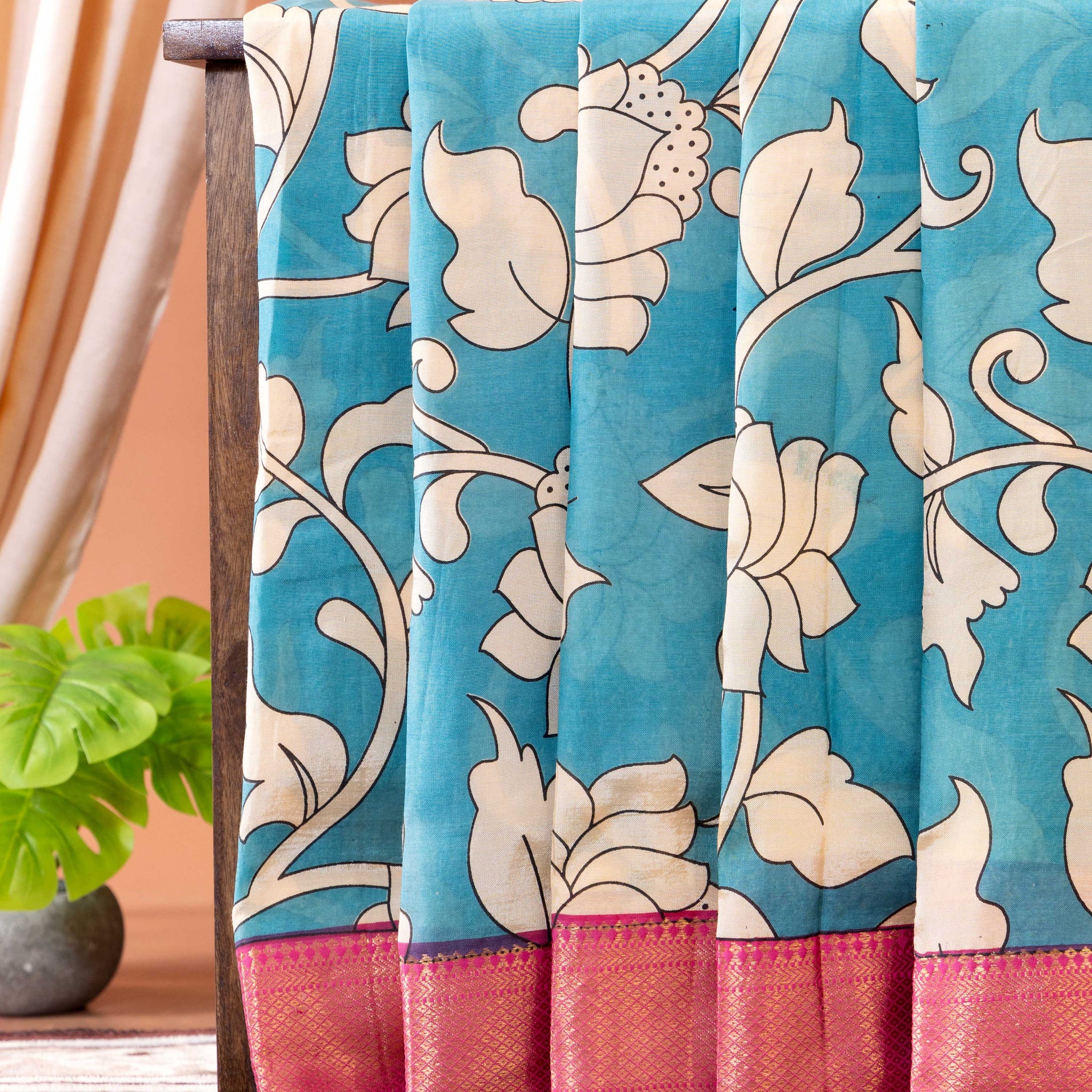 Traditional Semi Chanderi Saree with Floral Motifs and Zari Border - Blue