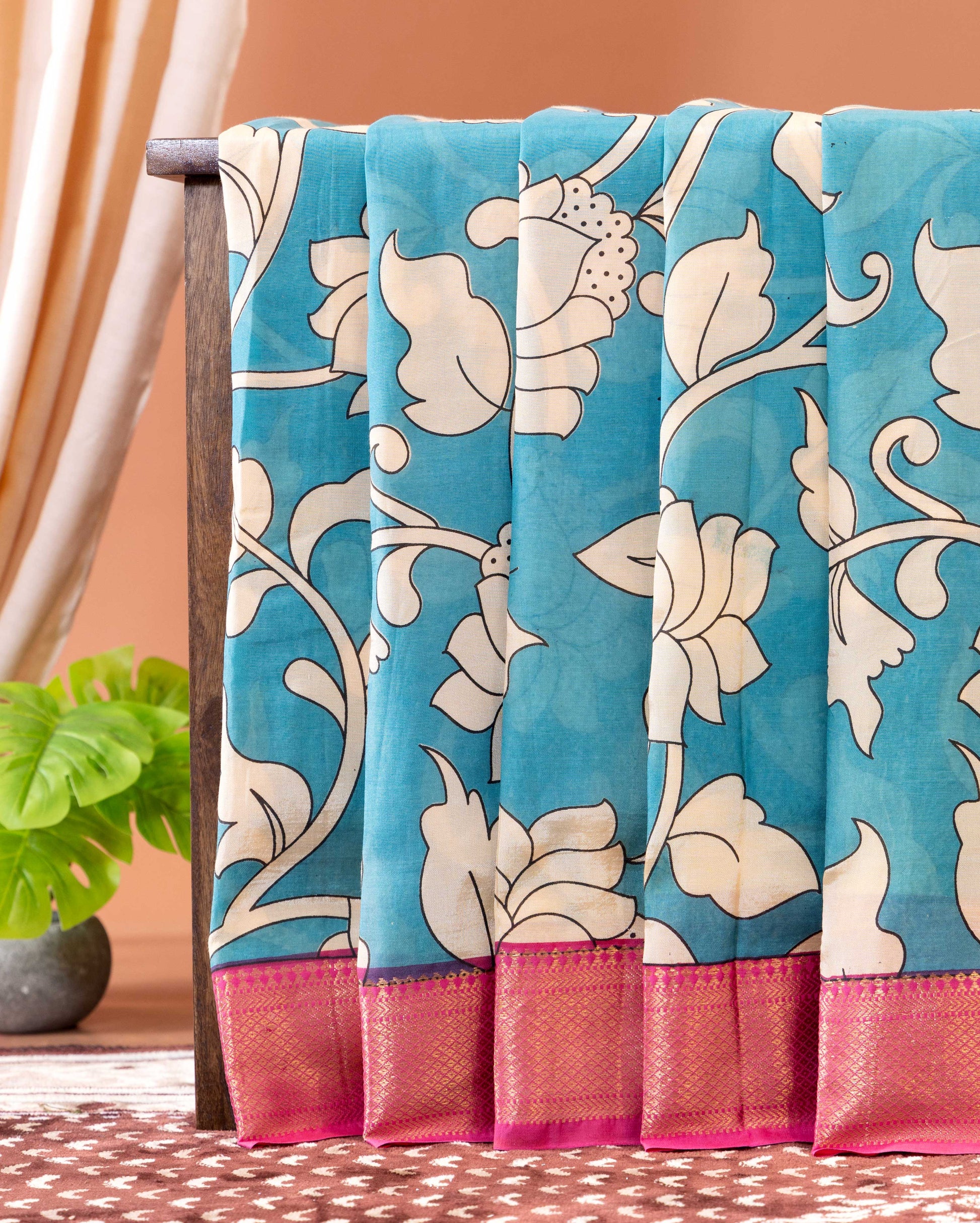 Traditional Semi Chanderi Saree with Floral Motifs and Zari Border - Blue