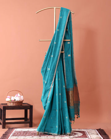 Traditional Semi Silk Cotton Saree Golden Zari Border and All-Over Thread Motifs - Teal