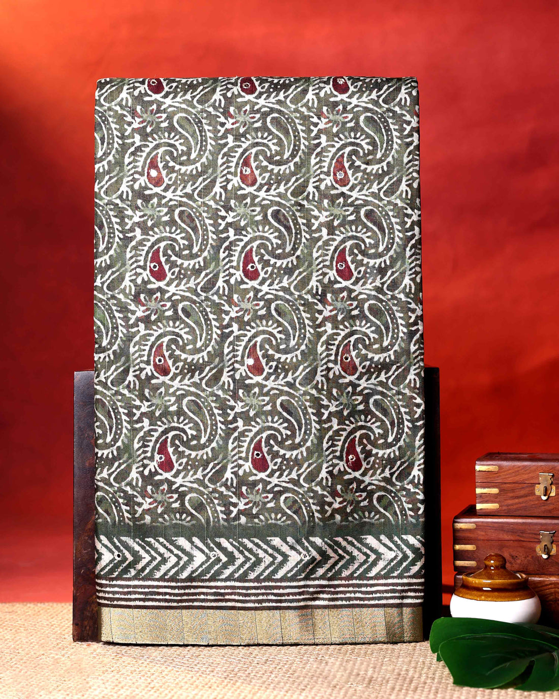 Traditional Semi Tussar Saree with Paisley Inspired Motifs and Geometric Woven Border - Green