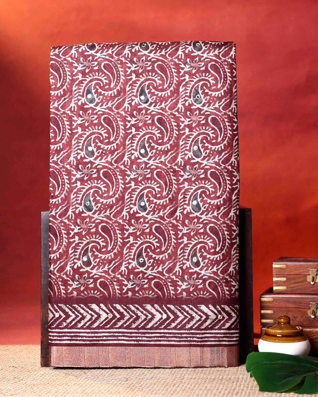 Traditional Semi Tussar Saree with Paisley Inspired Motifs and Geometric Woven Border - Maroon
