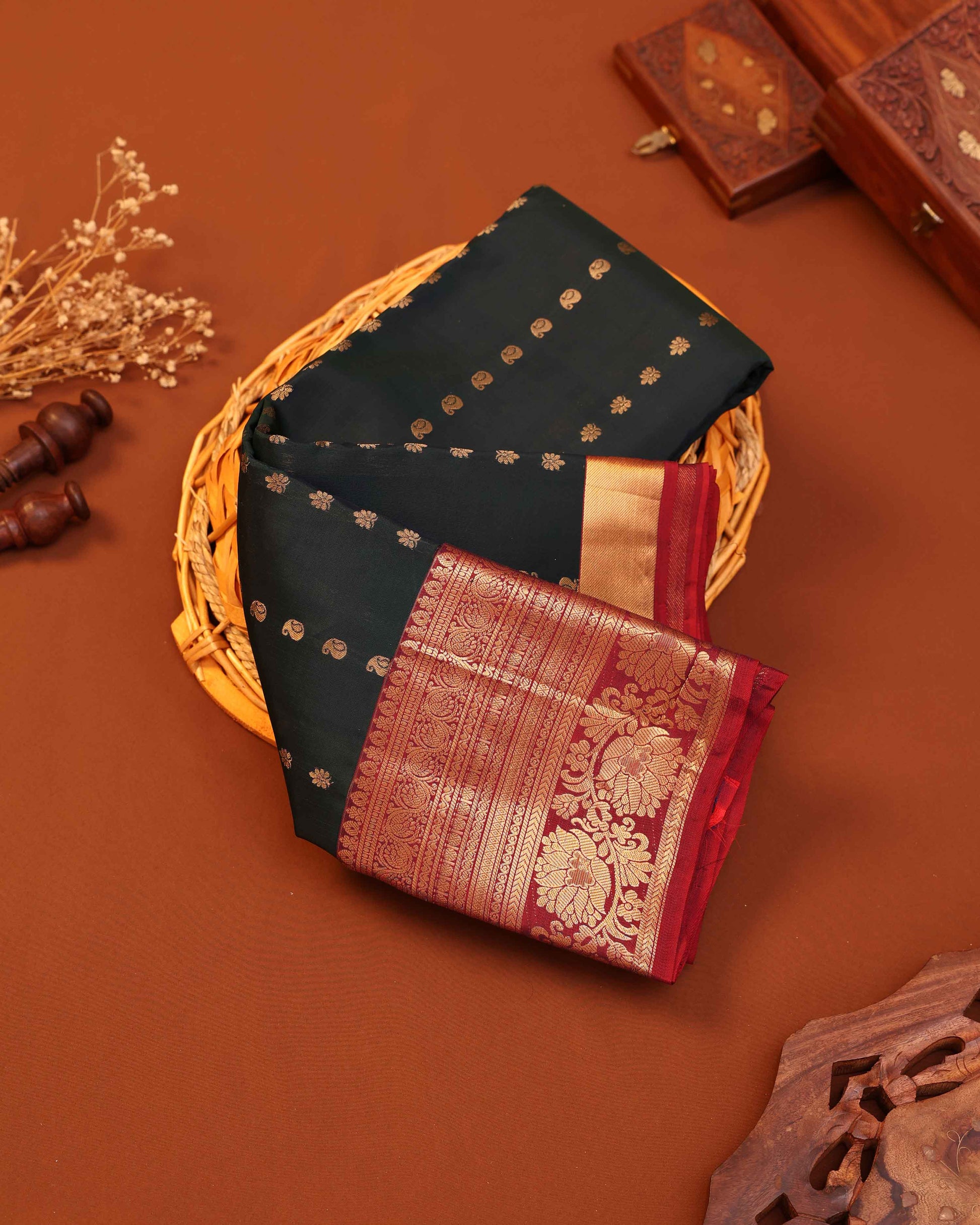 Traditional Silk Saree with Intricate Zari Motifs and Rich Ornamental Border Design - Dark Green